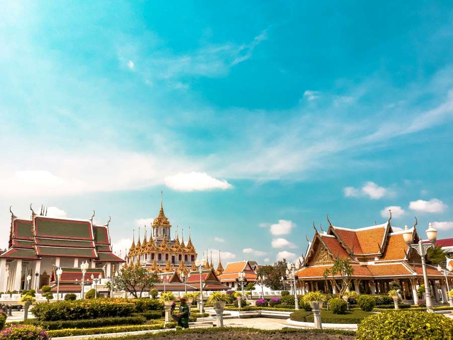 Traditional Thai temples with golden spires in Bangkok, Thailand — a popular visa-free destination for Indian travelers.
