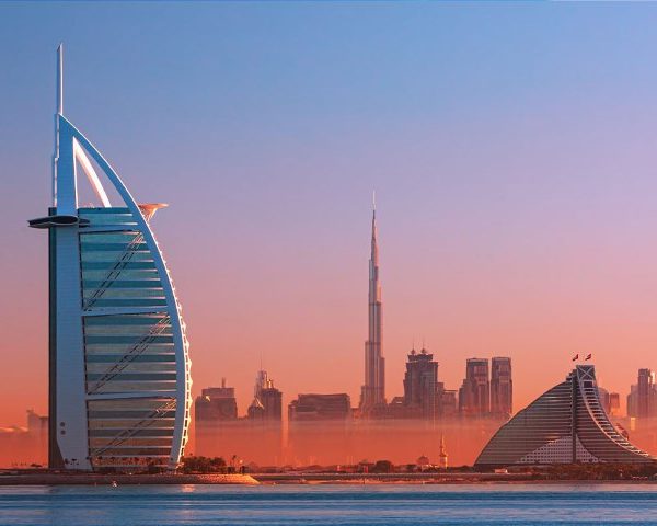 Sunset view of Dubai skyline with Burj Khalifa and modern skyscrapers