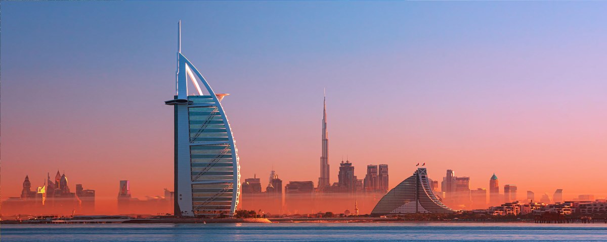 Sunset view of Dubai skyline with Burj Khalifa and modern skyscrapers